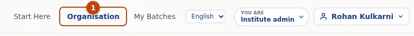 The menu bar in your admin hat: Start Here, Organisation (1), My Batches, the language picker, the YOU ARE hat menu and your account.